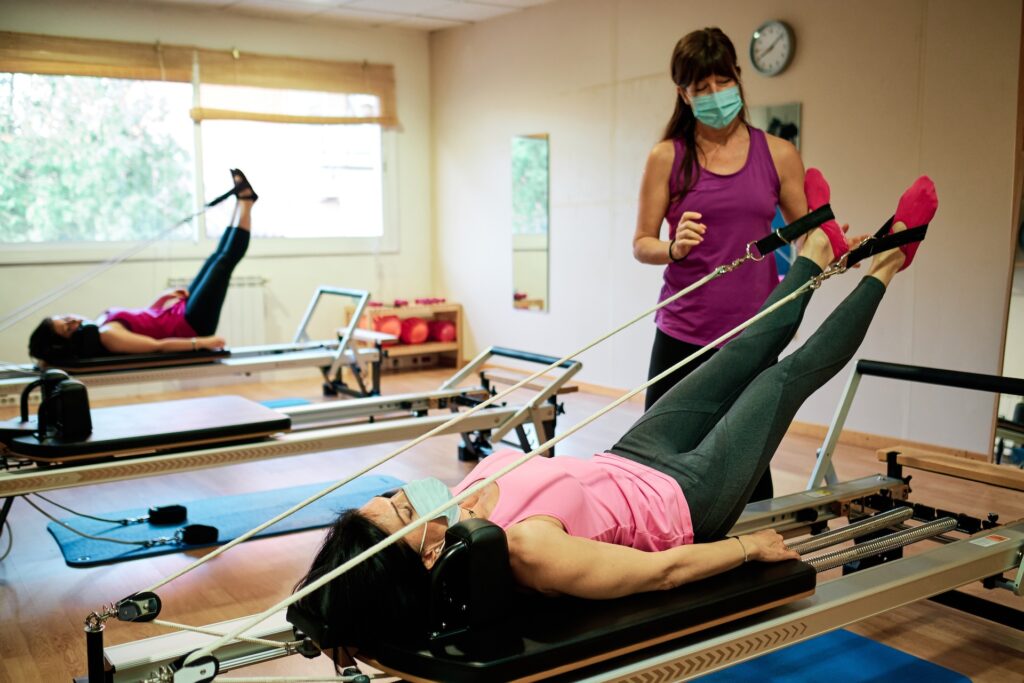Pilates 2 group of mature women doing excercise pilates and 2025 03 05 05 30 53 utc1